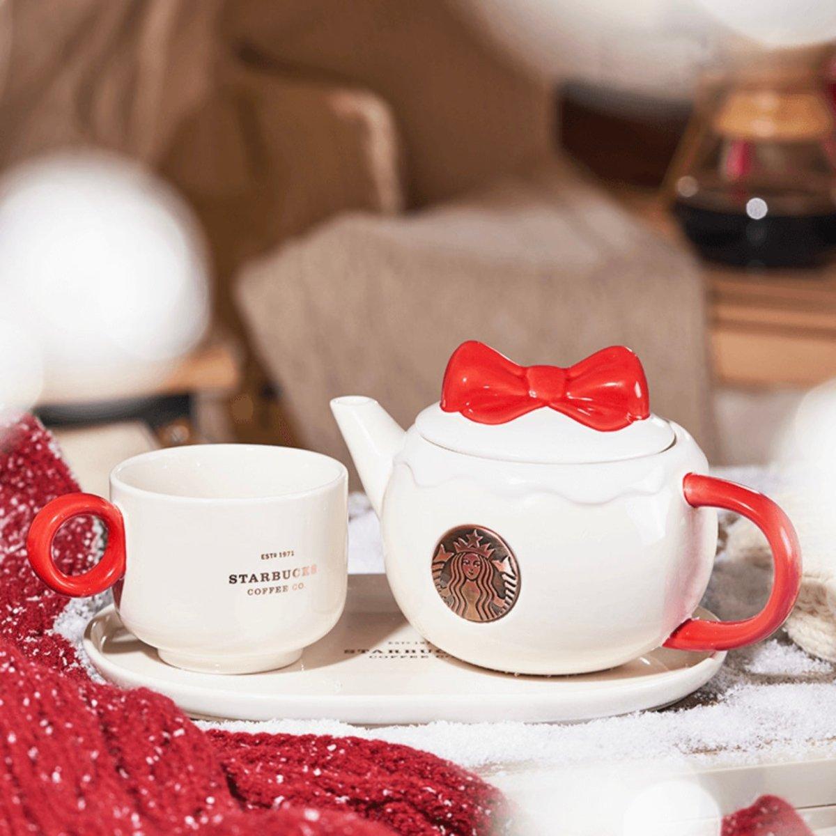 http://annannstarbucks.com/cdn/shop/products/starbucks-610ml21oz-red-ribbon-ceramic-teapot-and-cup-with-saucer-ann-ann-starbucks-1.jpg?v=1694684181